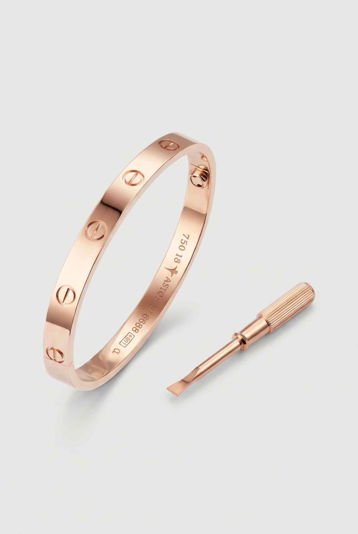 Astos screw armband rosé goud verguld - productfoto met schroevendraaier
