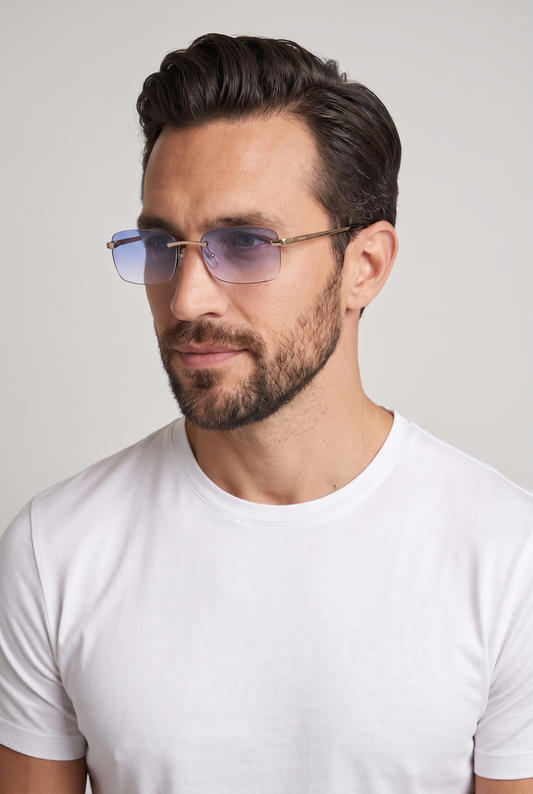 Astos Eyewear Blue Gradient zwarte poten - randloze zonnebril met blauw verloop gedragen door model, studio