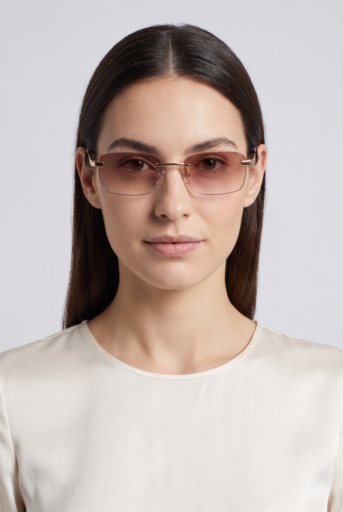 Astos Women's Eyewear Brown Gradient - randloze zonnebril met bruin verloop gedragen door model, studio
